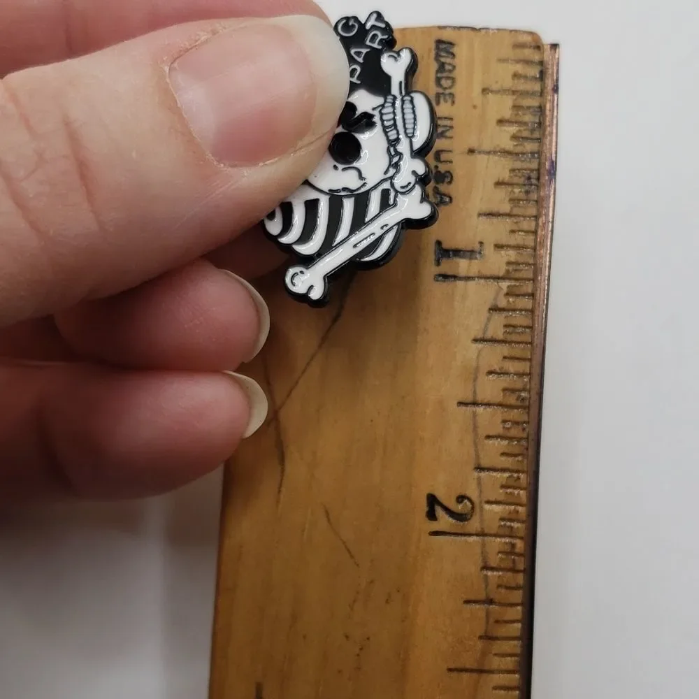 Skull and skeleton bones falling apart enamel fashion pin